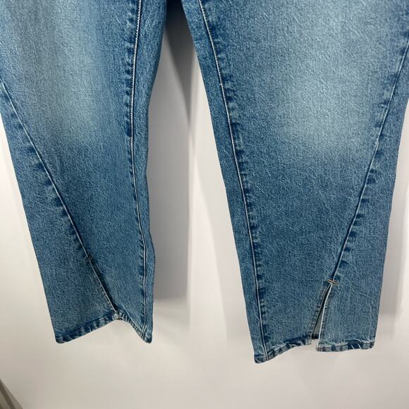 Good American Good Boy Twisted Slit Jeans in Blue875 High Rise - Picture 5 of 9